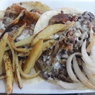 Logotipo de Tacos al Carbón SLP
